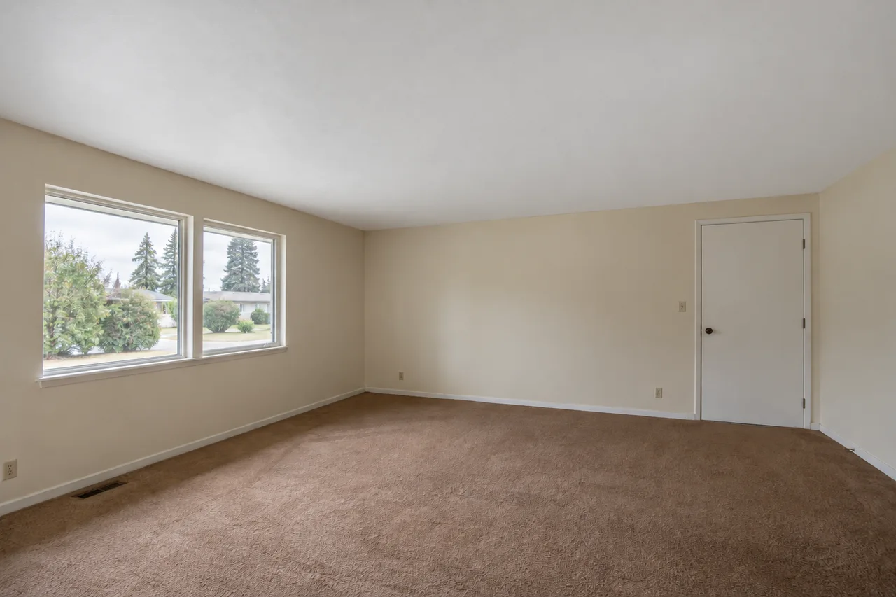 The same room with a smooth ceiling finish.
